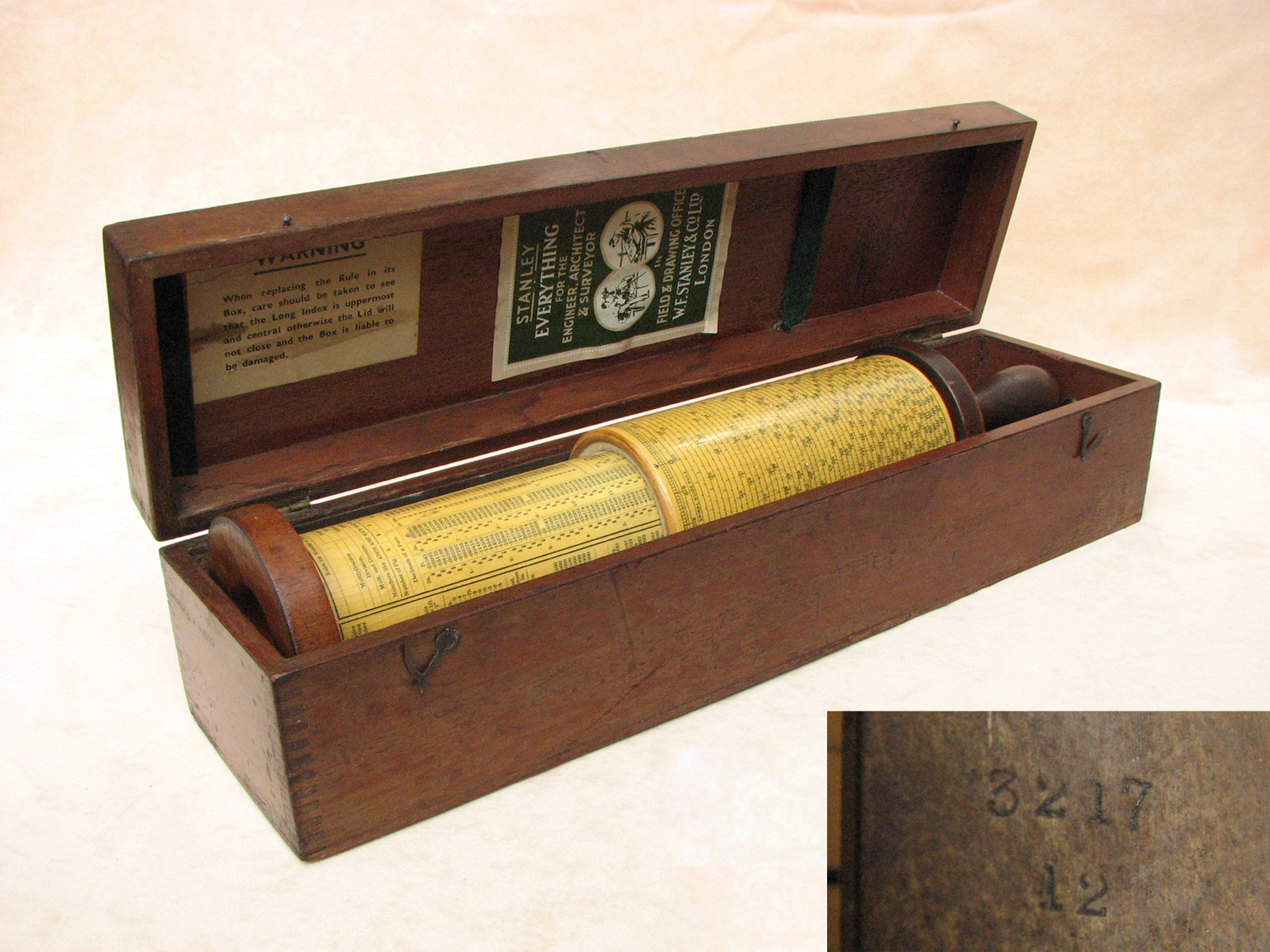 Early 20th century Stanley Fullers Slide Rule dated 1912 with instruction book
